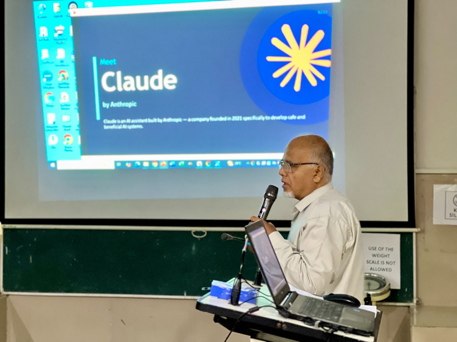Dr. Abid Ali facilitating a live demo of Claude AI during the JSMU emerging AI tools training
